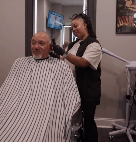 Solo barber finishing a client's cut alone in a private Odenton beauty suite